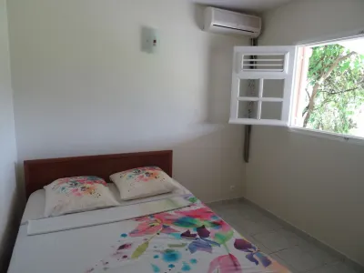 F2 Bottom corner villa with veranda and trees Hotels in 