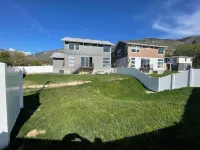 Brand New modern 3 story home with fenced in yard! Outdoor hot tub and firepit