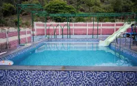 Opulence Resort Nagaon Alibaug - de playa