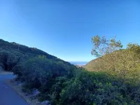Panoramic hillside house with sea view