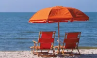 Sunset View Beach Bungalow - Pets Allowed. Amazing covered deck and yard.