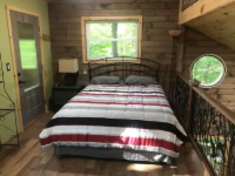 Secluded treehouse with indoor fireplace