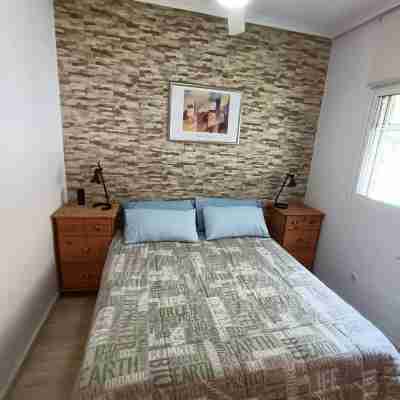 Semi-detached villa in private residential with pool Rooms