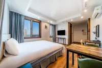 Check Inn Hotel Jeju Hotels near Yongduam Rock
