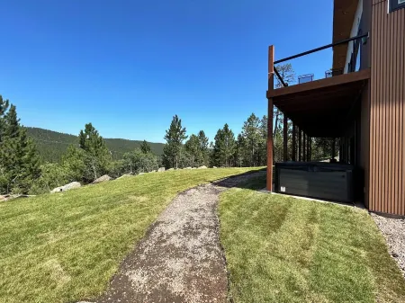 Casa del Sol is a private oasis surrounded by trees near Pactola Lake.