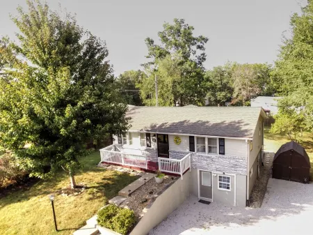 South central 4 bedroom house 3 minutes from Faurot Field! Its close and quiet.