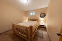 Luxury & Tranquility on 8 Acres Bordering Brush Creek! Secluded 3-Level Home.
