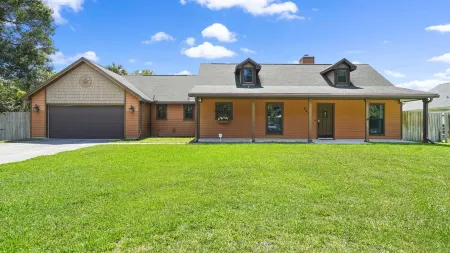 Spectacular home with outdoor POOL and LAKE view (62nd St N)