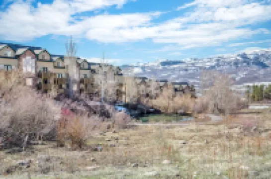 Two level condo with gourmet kitchen, upstairs remodel, and outdoor wonderland.