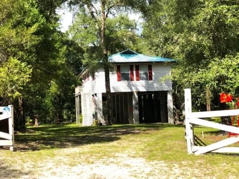 Suwannee River Retreat with Private Dock, Free Kayaks, and Fire Pit