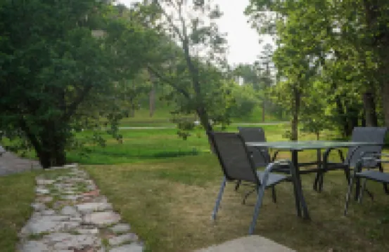 Remodeled home in the woods, just past city limits. With horse pasture nearby!