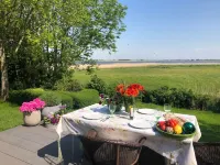 HOLIDAY APARTMENT WITH OWN SEA ACCESS AND GARDEN