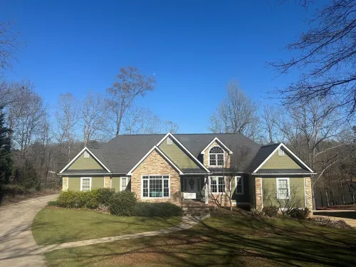 Beautiful lakefront home on over an acre with lots of room, views, and amenities