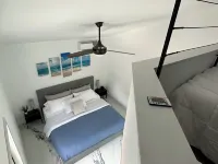 Private guest house with king bed & loft. Deck with hot tub and putting green