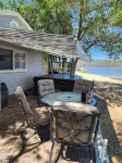 Charming 2 Bedroom Waterfront Cabin at West Magic Id. 83352 with Hot Tub.