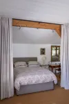 The Garden Room. Timber framed, light and airy accommodation with veranda.