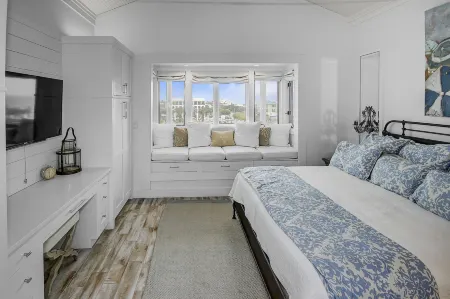 Beach and Gulf Views from the Center of Seaside! 2 Bedroom Condo by RedAwning