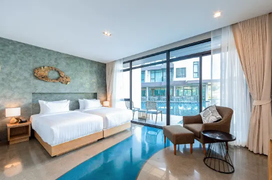 ห้องดีลักซ์เตียงแฝดพร้อมทางเข้าสระว่ายน้ำ