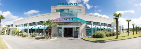 Hôtel du Casino de Capvern Отели в г. Гурдан-Полиньян