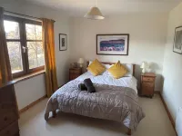 4 bedroom house with large garden  in Cairngorms -  ideal for families فنادق في Nethy Bridge