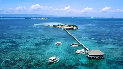 Nalusuan Island Resort and Marine Sanctuary Hotels near Lava Island