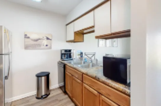 Golf-view condo with patio, central AC, pool, tennis & golf on-site