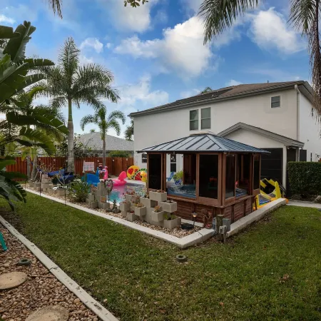 Gorgeous Urban Oasis W/Hot Tub, Heated Pool and Private Movie Theater 3 Bedroom Home by Redawning