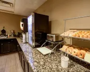 Charlotte Suites by IHG - servizio colazione