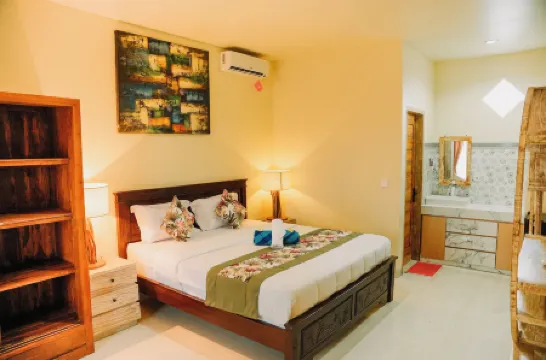 Taman Asih Bingin Homestay Отели рядом с достопримечательностью «Пляж Дримлэнд»