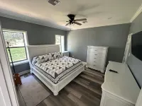 Charming 1-bedroom cottage in Ridge/Judice community with central AC/Heating.