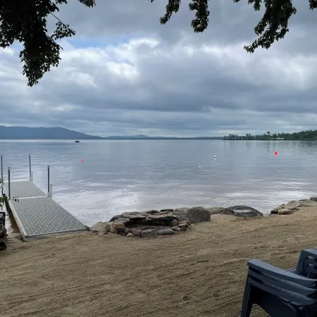 Cozy lakefront home on Ossipee Lake, w/beach, dock and amazing view. Отели в г. Оссипи