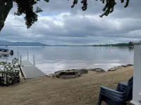 Cozy lakefront home on Ossipee Lake, w/beach, dock and amazing view.