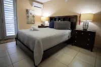 Beachfront in gated community with patio,  balcony, pool, close to all in Rincón