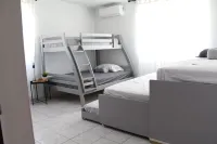 Spacious Beach Stay 3-bedroom House with Pool steps from the beach in Loiza