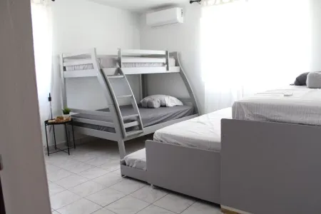 Spacious Beach Stay 3-bedroom House with Pool steps from the beach in Loiza