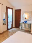 Spectacular sea view of the entire bay of Su Giudeu. King size bed +topper