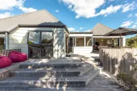 All day sun house with metres away from the golden sands of Onetangi Beach.