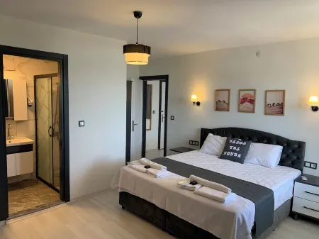 Assos taş konak Отели рядом с достопримечательностью «Behramkale»