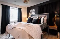 Charming house, sleeps plenty with Hot Tub and large backyard and fire pit