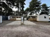 Your mobile home with covered terrace and barbecue is waiting for you this summer.