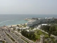 Sheraton ganna inn Hoteles cerca de Playa Mamoura