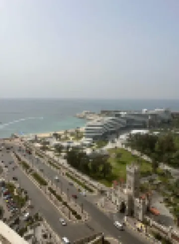 Sheraton ganna inn Hôtels à proximité de : Plage de Mamoura