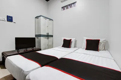 OYO 95130 Poerto Lemon Guest House Hotel berhampiran Pantai Nglambor