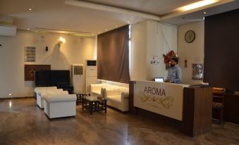 Hotel Aroma Inn - Housity