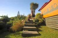 Moanarua Beach Cottage Hotels near Wharekura Reserve