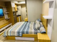 RedLiving Apartemen Grand Kamala Lagoon by Ownr Room