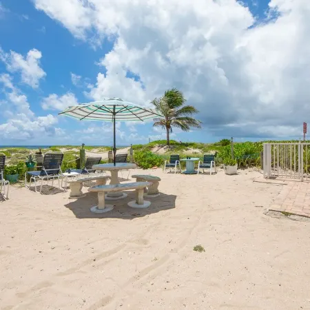BEACHFRONT COMPLEX! STEPS FROM THE OCEAN! HEATED POOL FULL KITCHEN FREE PARKING