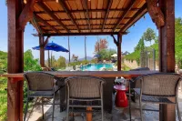 A private oasis to relax and play in the comfort of a gated 2-acre estate.