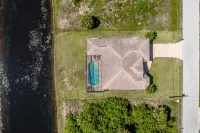 Luxurious & Spacious Canal Home with Heated Pool