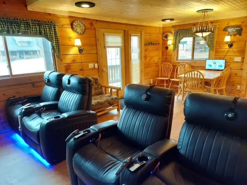 Entertainment Cabin: with 8 Large Screen TV's on 1 Wall.  Great for Small Groups
